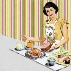 1950s housewife cooking a healthy meal.